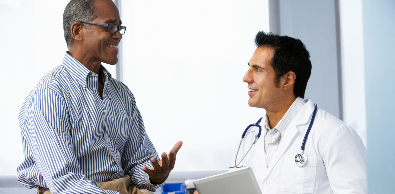 Male doctor and male patient